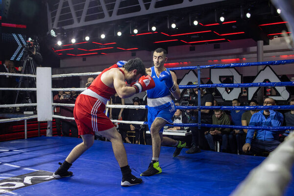 Bout between Kirimov Asif and Ovganisyan Stepan in the weight category up to 67 kg during Boxing Kharkiv Derby, located in Victory Concert Hall, Kharkov, Ukraine, 03.12.2021