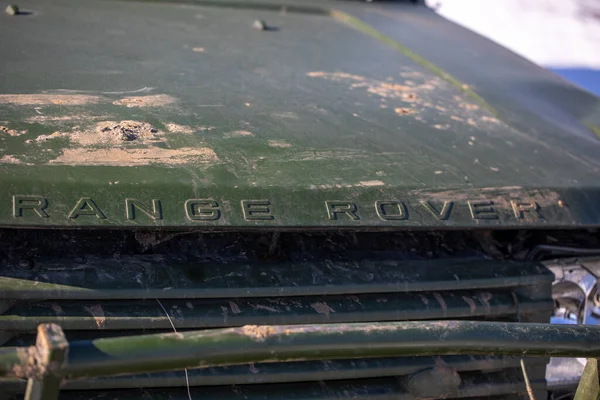 View of crashed Range Rover car in the highway. Broken car. Automobile crash. Damaged car after collision. Auto accident. Risks on the Road. 21.03.2022, Kharkiv, Ukrain
