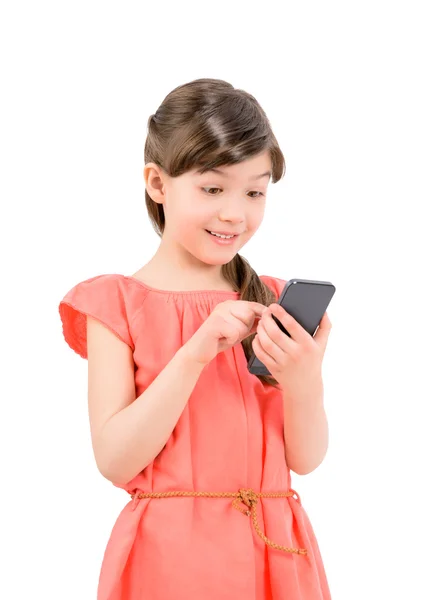 Sorpreso ragazza sms sul suo telefono cellulare — Foto Stock