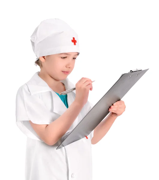 Koncentrera ung sjuksköterska skriva medicinsk rapport Stockbild