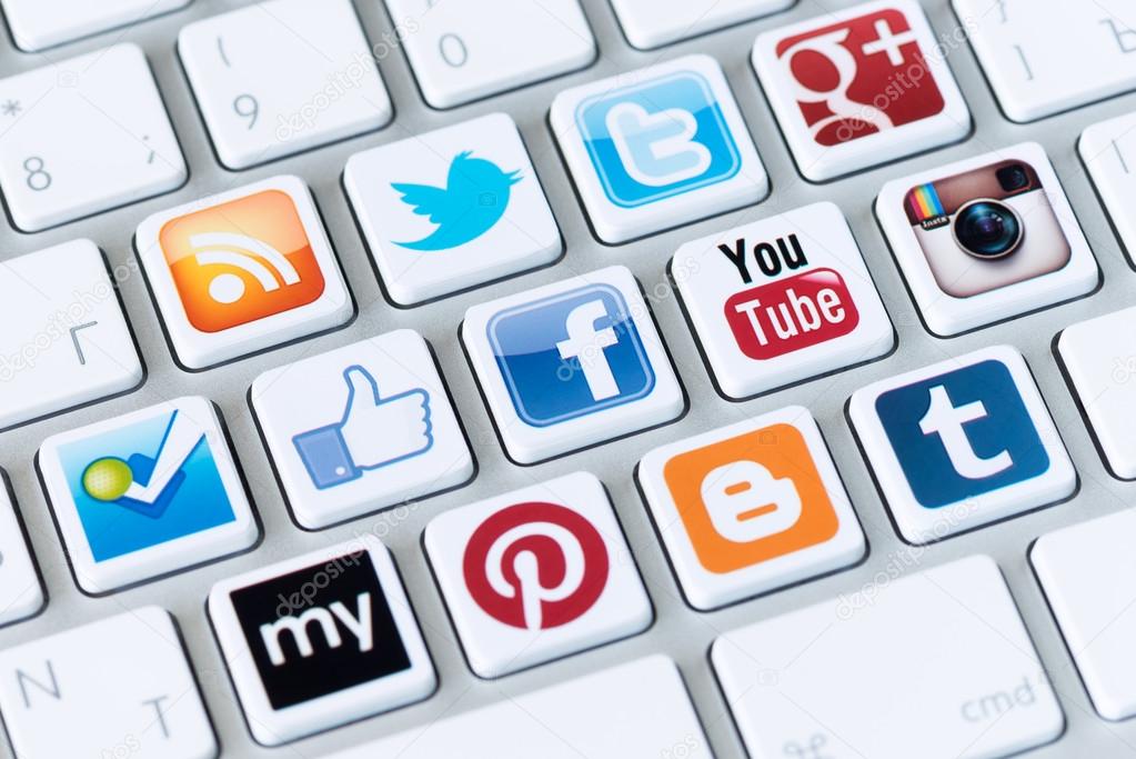Kiev, Ukraine - May 20, 2013 - A social media logotype collection of well-known social network brand's placed on modern computer keyboard. Include Facebook, YouTube, Twitter, Google Plus, Instagram and more other logos.