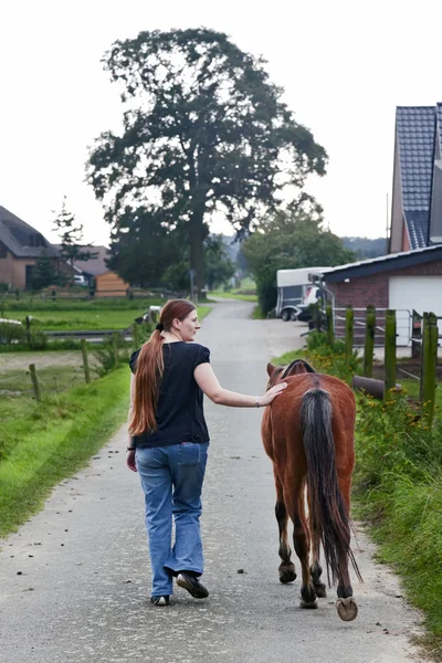 Woman and horse — Stock Photo, Image