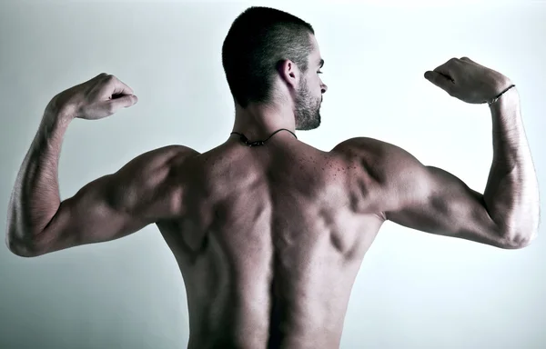 muscular young man back