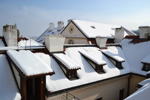 Roofs of Prague at winter — Stock Photo, Image