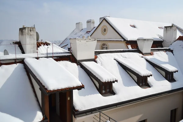 Roofs of Prague at winter — Stock Photo, Image