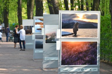 Photo exhibition in Summer Garden in Petersburg clipart