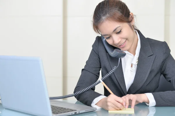 Young beautiful business lady talk with phone — Stock Photo, Image