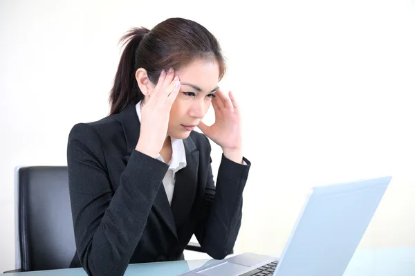 Portrait of tired young business woman — Stock Photo, Image