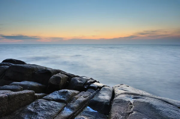 Zonsondergang op het strand — Stockfoto