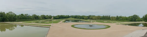 Garden of the Castle of Chantilly in France - Panoramic view Stock Picture