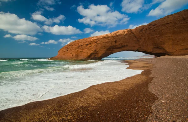 Natural arch on the beach Legzira. Morocco — Stock Photo, Image