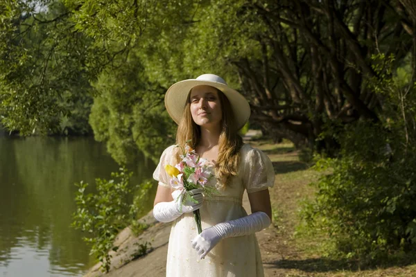 Lady with bouquet — Stock Photo, Image