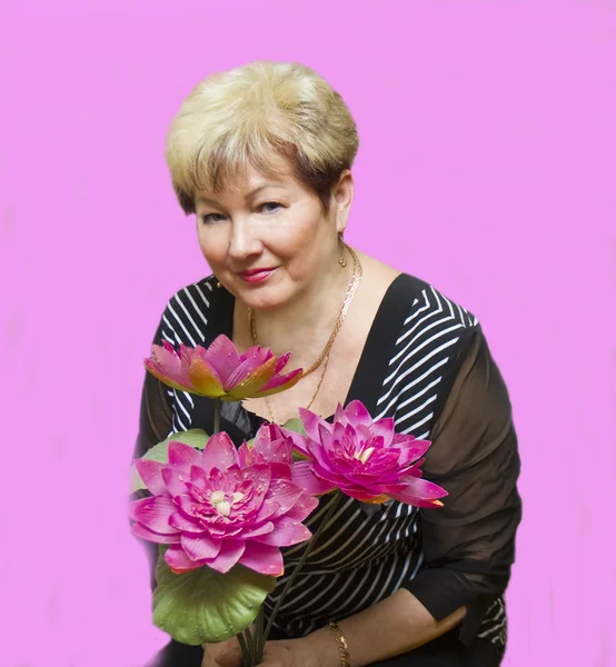 Woman with pink lotus — Stock Photo, Image