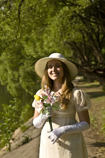 Lady with bouquet — Stock Photo, Image