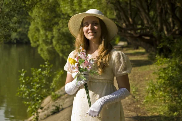 Lady with bouquet — Stock Photo, Image