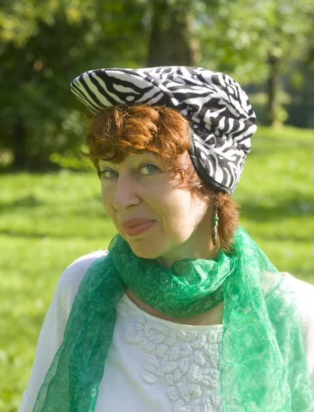 Portrait of woman in zebra hat — Stock Photo, Image