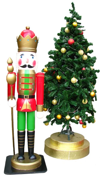 Rey de juguete y árbol de Navidad con bolas — Foto de Stock