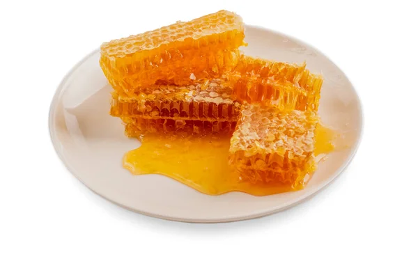 Honeycomb Bitar Vit Tallrik Isolerad Vit Bakgrund — Stockfoto