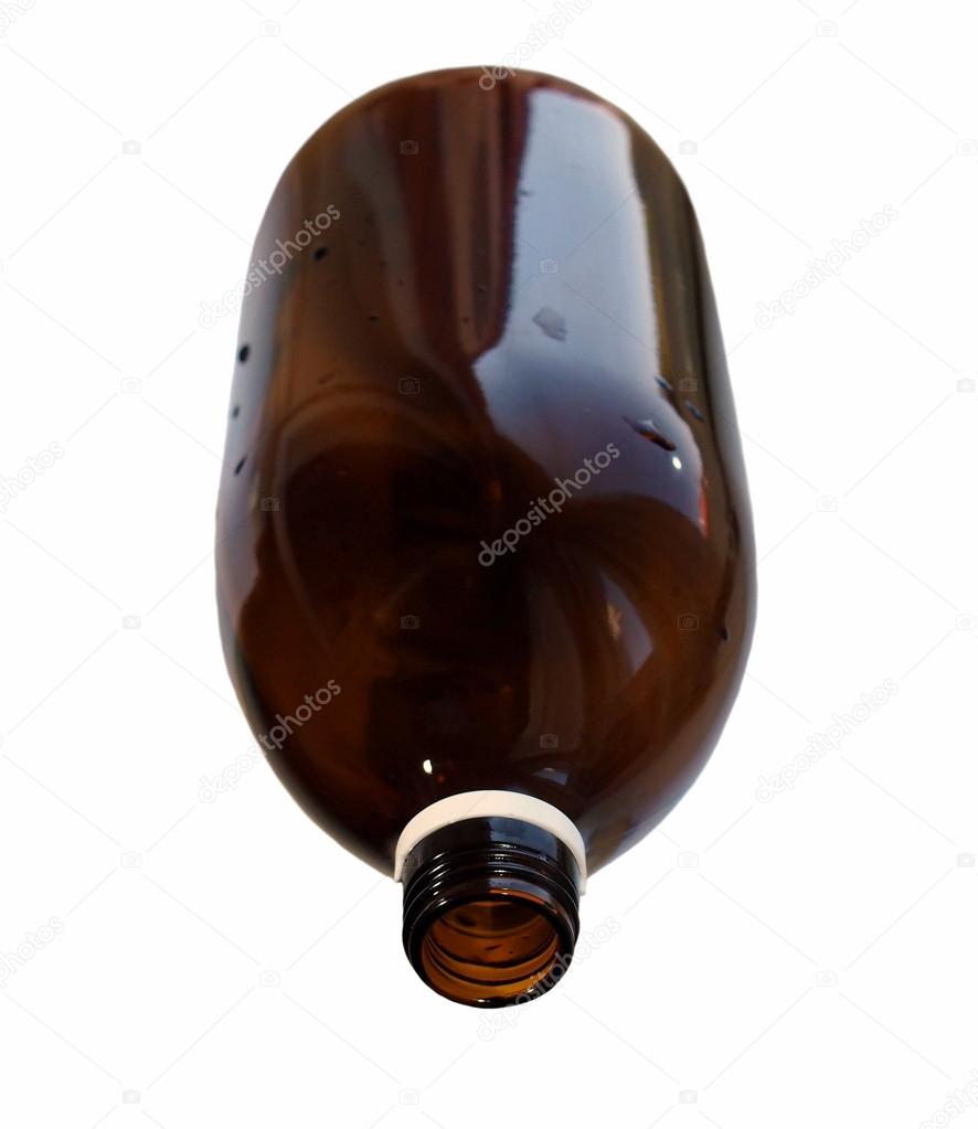 Empty medical bottle with water droplets