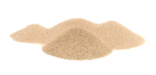 Macro stapel woestijn zand geïsoleerd op een witte achtergrond — Stockfoto