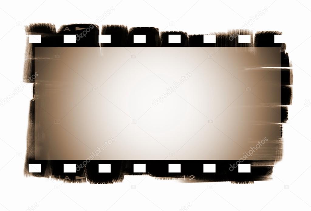 Old sepia blank film strip isolated on white