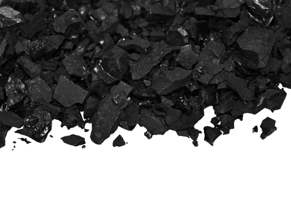 Pilha de carvão negro isolado no fundo branco Imagens De Bancos De Imagens