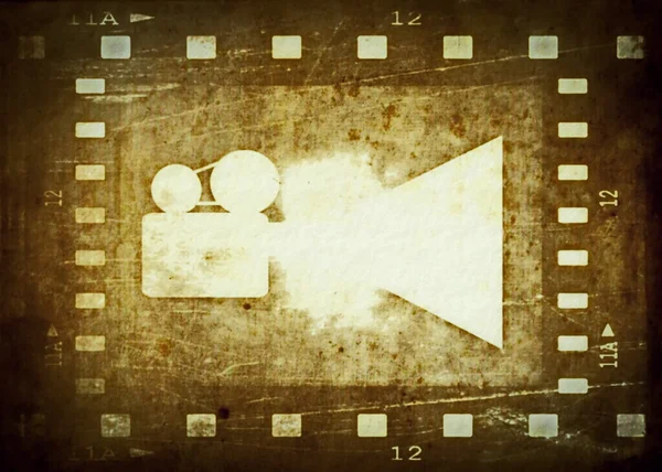 Vecchio telaio striscia di film e proiettore di film — Foto Stock
