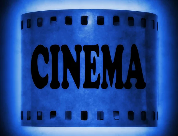 Palabra de cine sobre fondo de tira de película azul — Foto de Stock