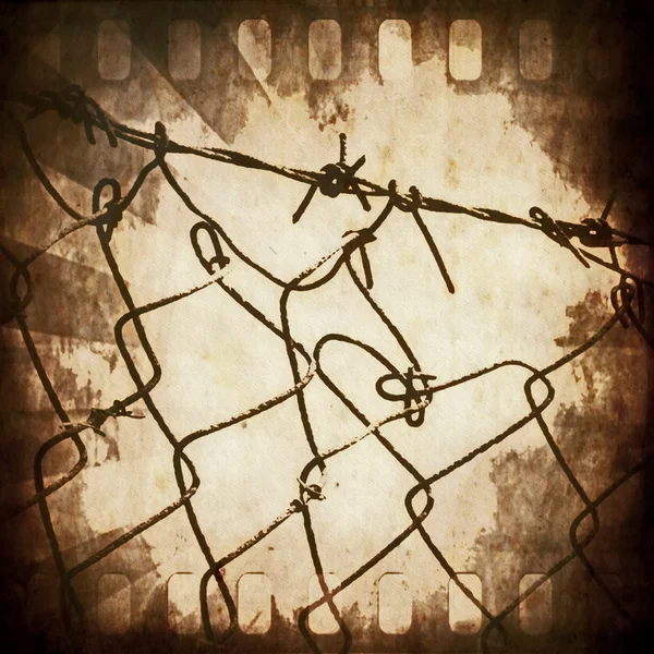 Concept old grunge film strip frame and wire fence background — Stock Photo, Image