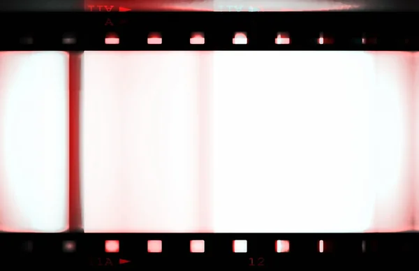 Lege kleurrijke film strip frame geïsoleerd op witte achtergrond — Stockfoto