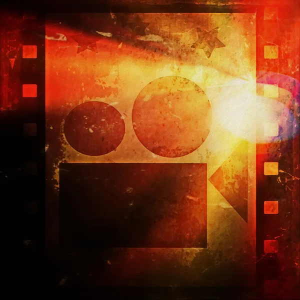 Старый гранж-ленточный кадр и кинопроектор — стоковое фото