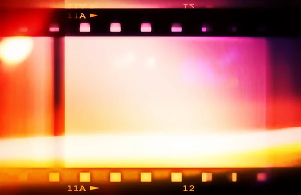 フィルム ストリップの背景のレトロな色とテクスチャ — ストック写真