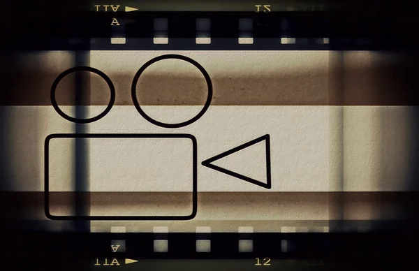 Старый ленточный кадр и кинопроектор — стоковое фото
