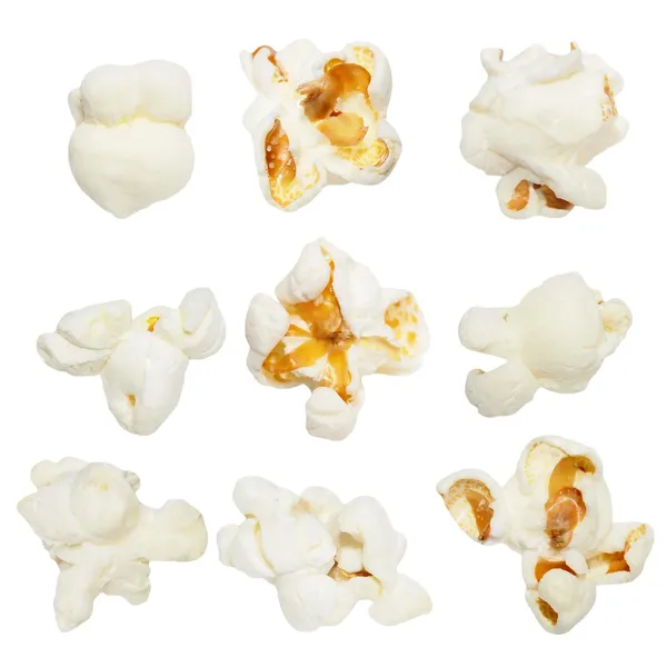 Makro popcorn izolovaných na bílém pozadí — Stock fotografie