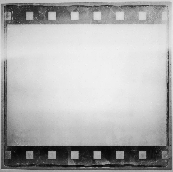Vecchio grunge pellicola striscia cornice sfondo — Foto Stock
