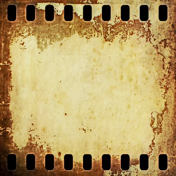 Antiguo grunge oxidado película en blanco tira de fondo —  Fotos de Stock