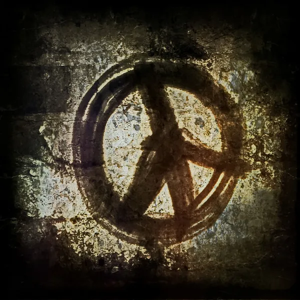Symbole de paix, vieux fond de brique grunge — Photo
