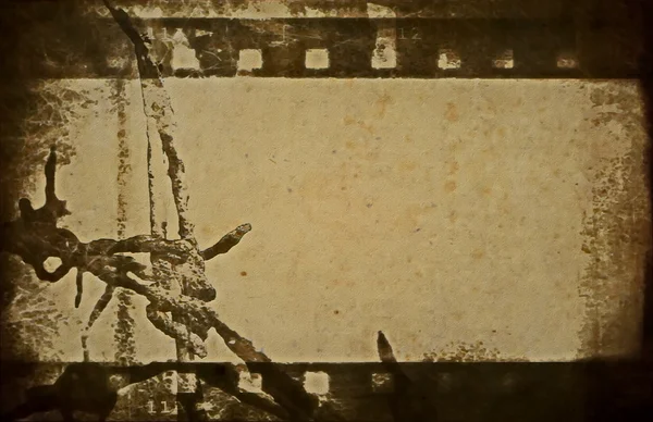 概念旧的垃圾电影地带和带刺的铁丝网背景 — 图库照片