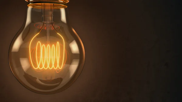 Close up of an illuminated vintage hanging light bulb over dark — Stock Photo, Image