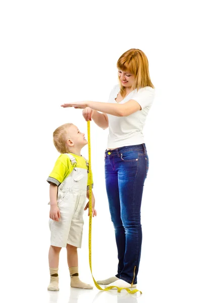 Žena měření dítě — Stock fotografie