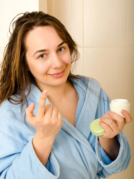 Woman with cream — Stock Photo, Image