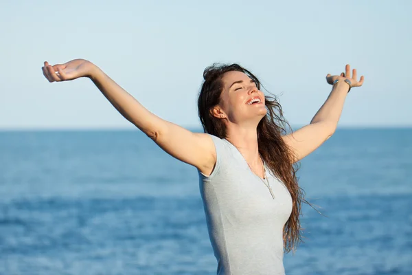 Beautiful woman with arms outstretched — Stock Photo, Image