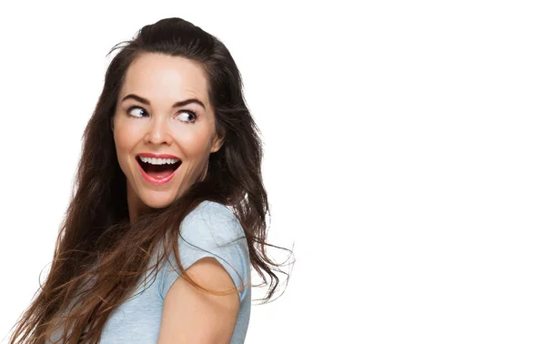 Surprised woman looking over shoulder — Stock Photo, Image