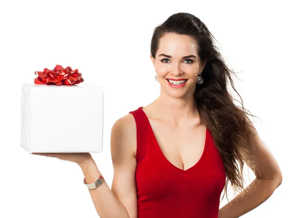 A happy woman holding a gift — Stock Photo, Image