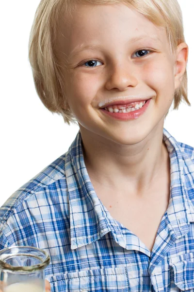 Happy cute boy with milk moustache. — Stock Photo, Image