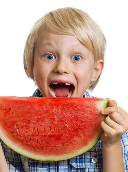 Close-up of boy taking bite of water melon — Stock Photo, Image