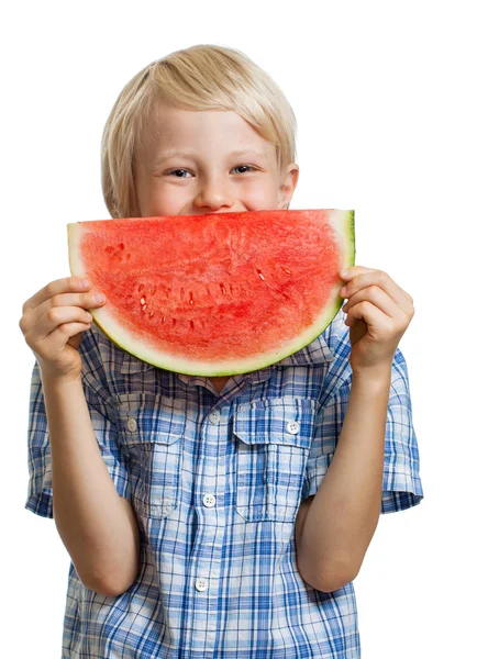 Cute boy peeking behind water melon — Stock Photo, Image