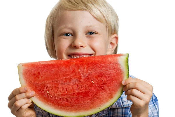 Close-up of boy smiling behind water melon — Stock Photo, Image