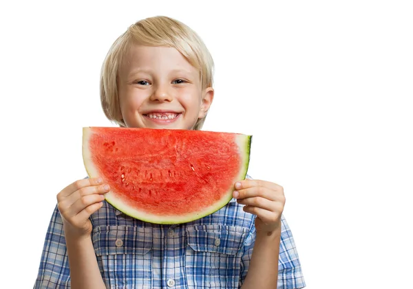 Šťastný chlapec s plátkem melounu — Stock fotografie