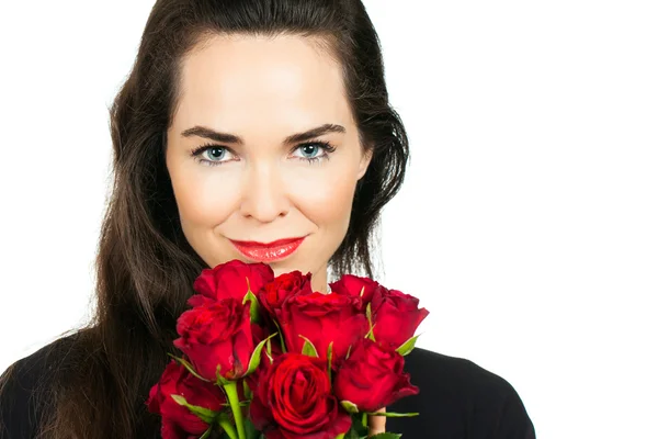 Woman holding bunch of roses — Stock Photo, Image